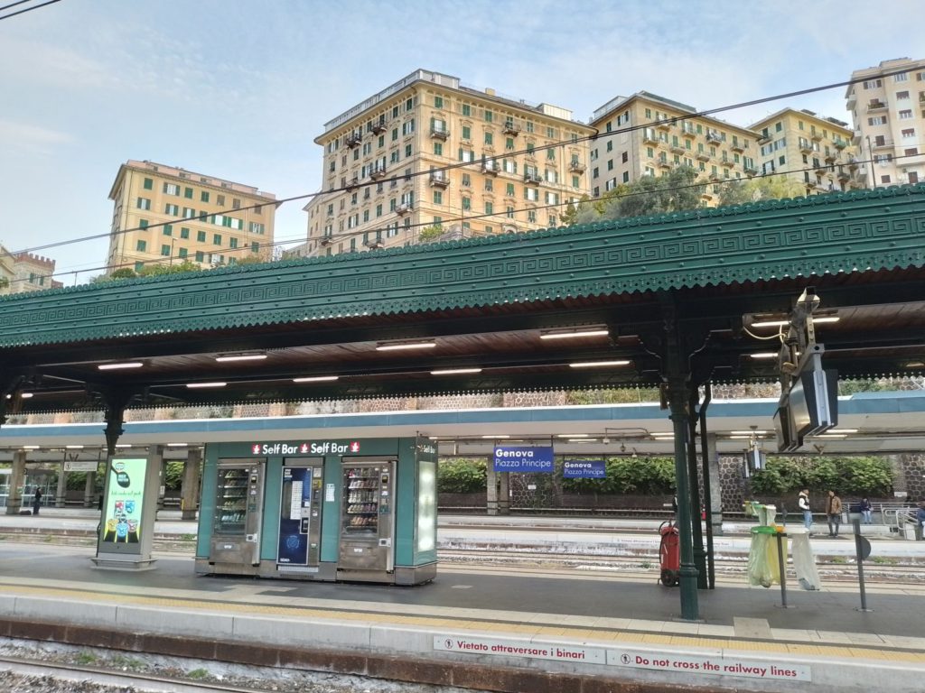 Genova's main train station with high-rise apartments wrapped around it. 
