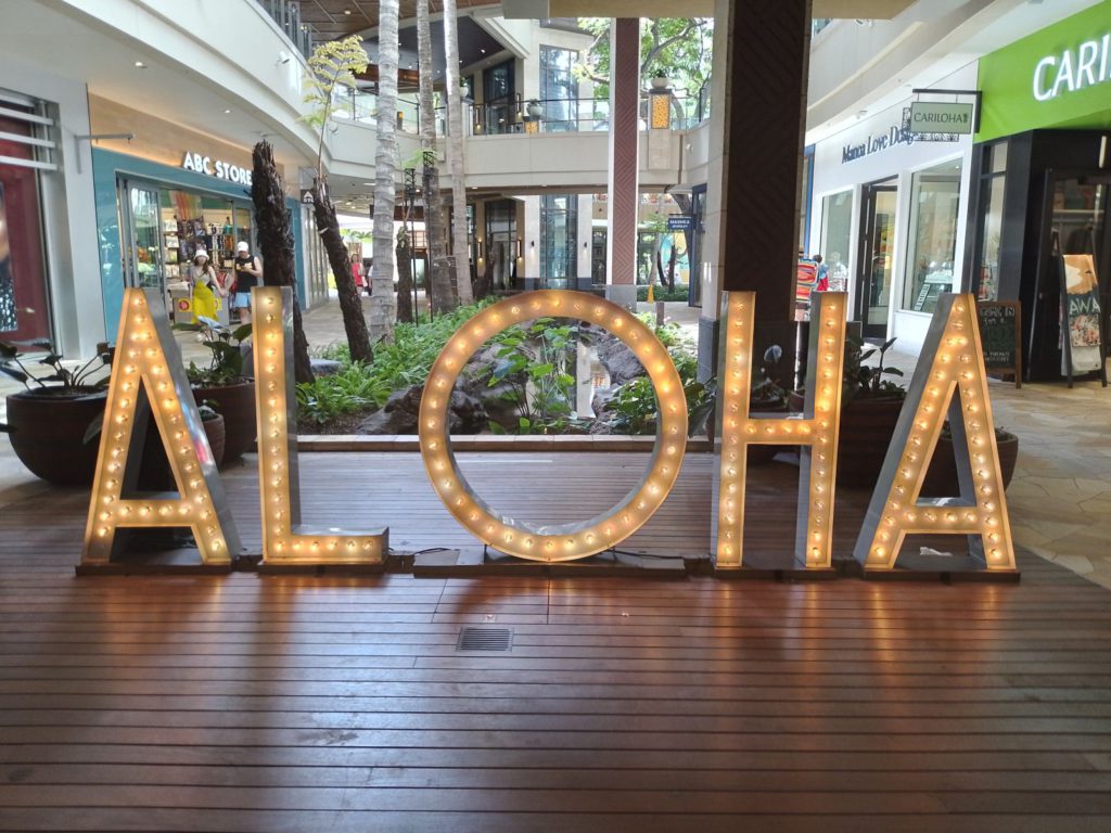 Aloha sign inside International Market Place, Hawai'i