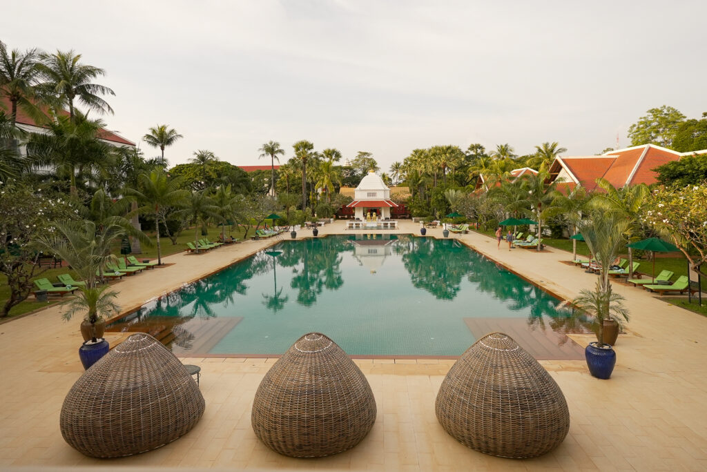 Poolside at Raffles Grand D'Angkor.