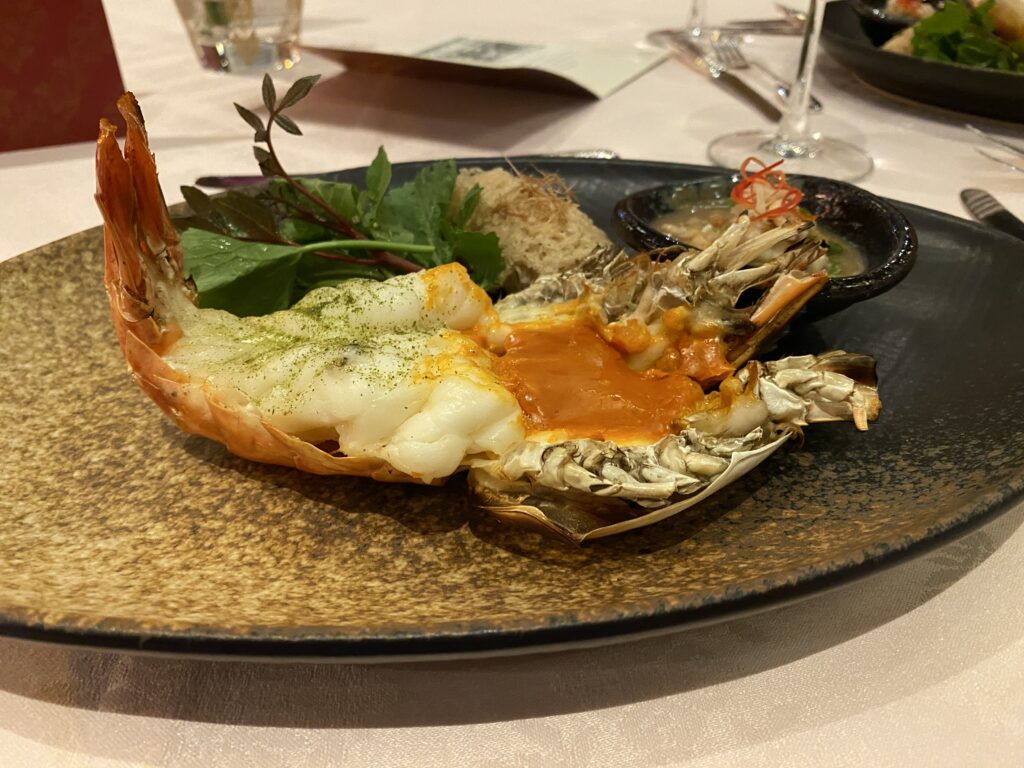 Grilled river prawn with tomalley and crispy fish floss at Sala Rim Naam restaurant